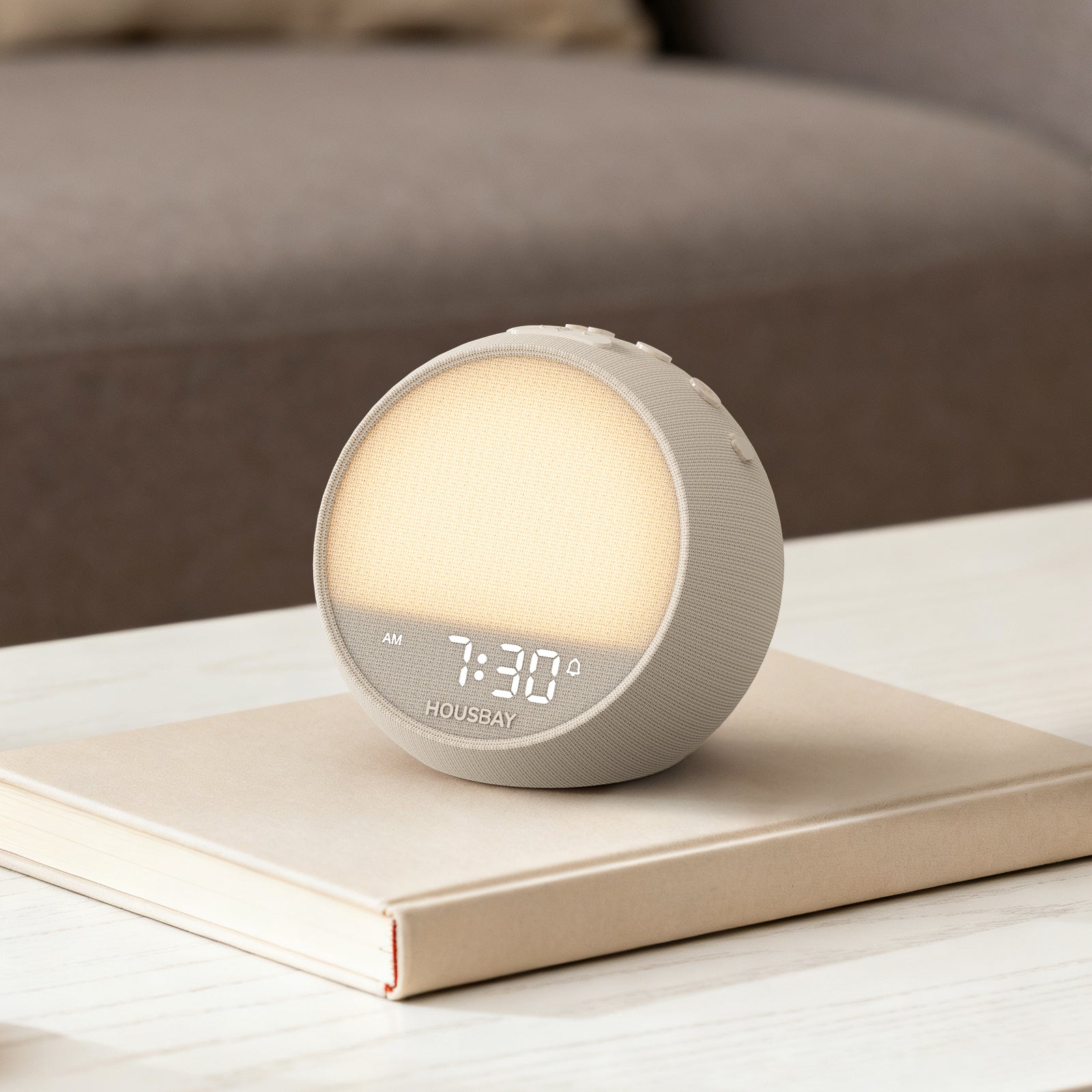 Rhythmana MINI sunrise wake-up light on bedside table