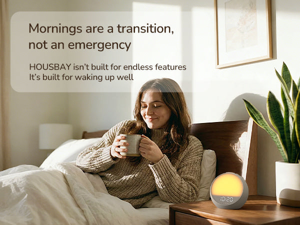 Woman enjoying a calm morning routine with HOUSBAY on the bedside table