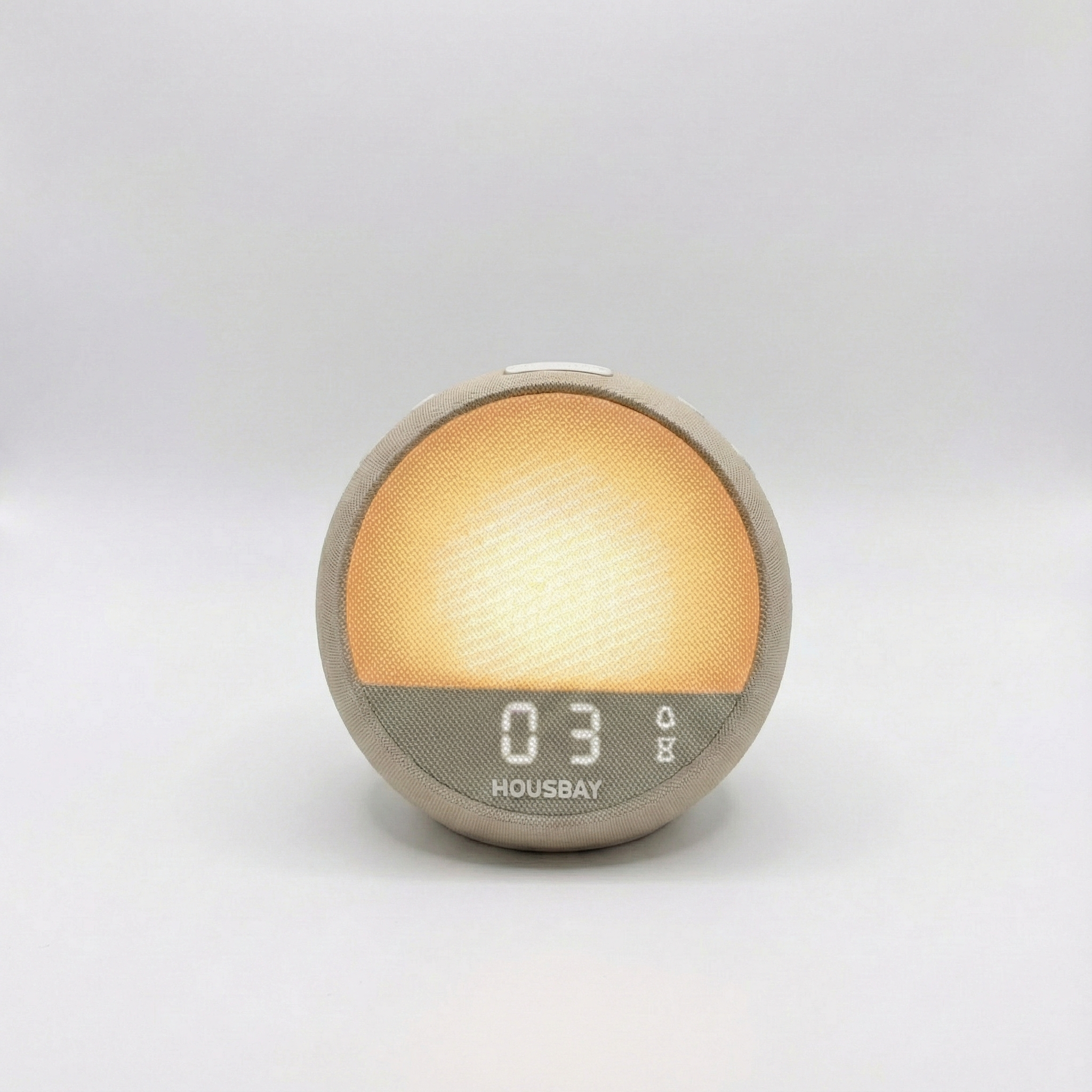 HOUSBAY Mini Awake in Ambient Flow mode showing golden sunrise light for users who love natural wake-up light.