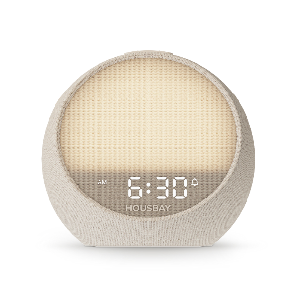 Round beige sunrise alarm clock（housbay mini） with digital display on a white background