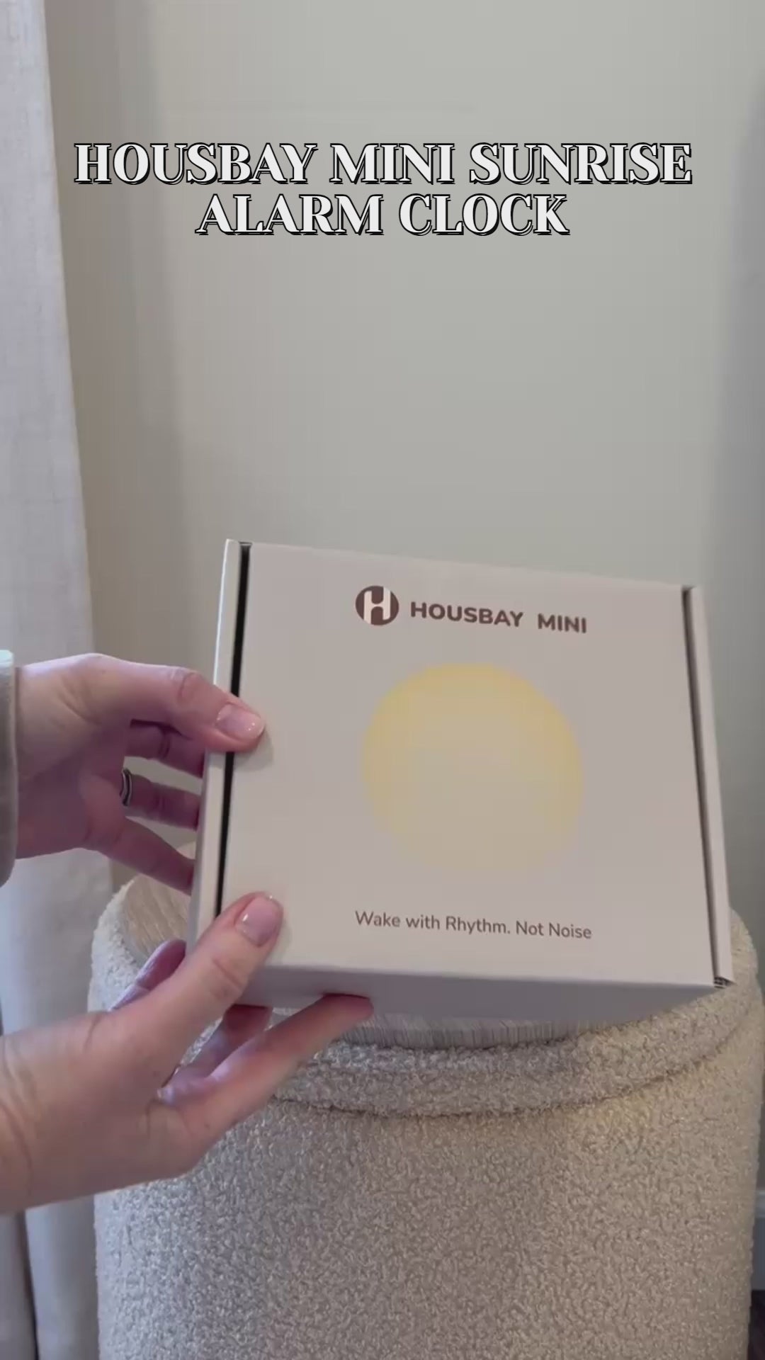 User setting the HOUSBAY Mini sunrise alarm clock buttons for a gentle morning wake-up